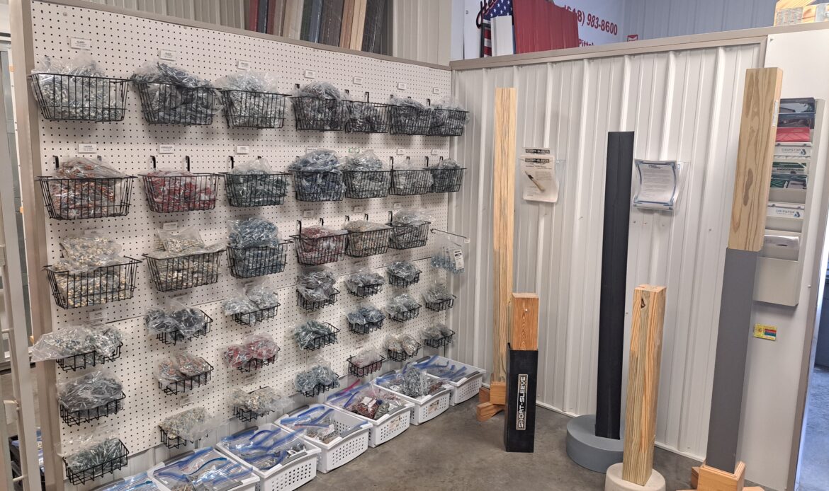 Building supplies and graber posts on the inside of Heartland Metal and Building Supplies showroom